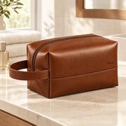 Brown ALTAIR wash bag in a bathroom